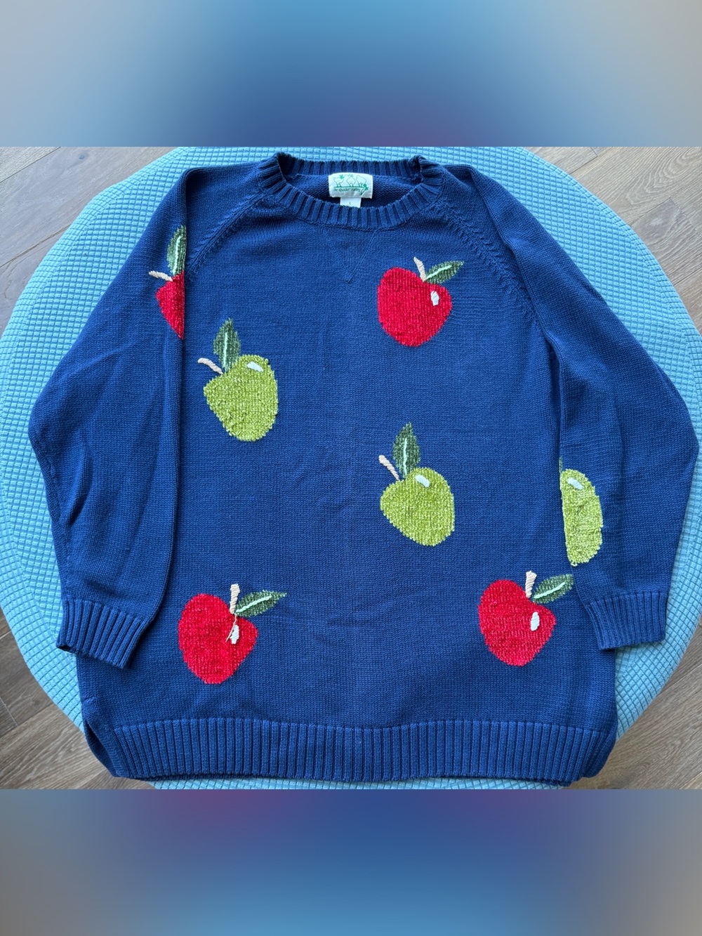 The Quacker Factory Sweater with Red and Green Apple Pattern size Large.
